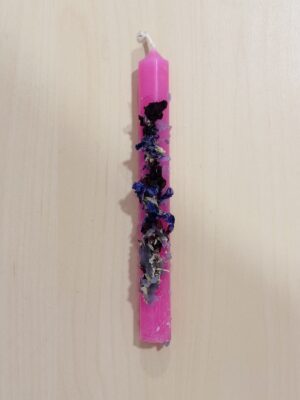 Vela rosa ritualizada
